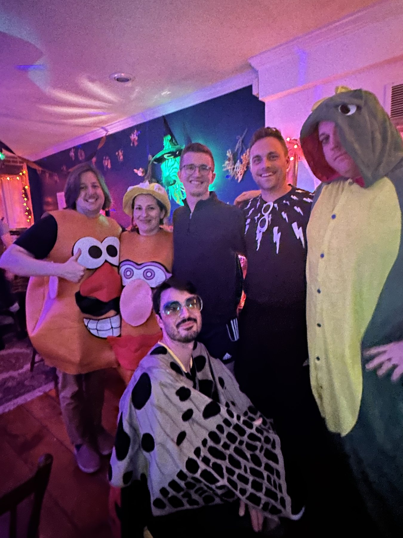 Ensemble members dressed in costumes at a party